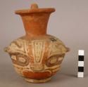 Polychrome pottery jar with spout