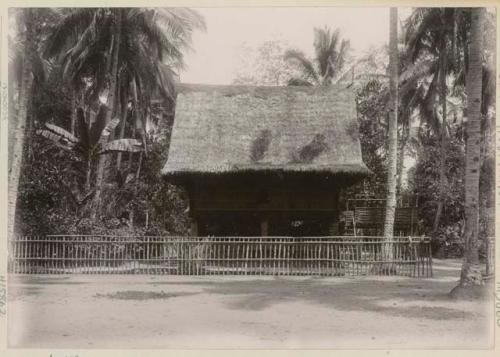 Building with fence in front