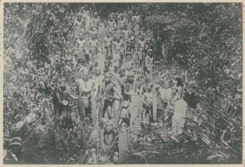 Group of armed men in jungle