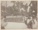 Group of people next to a structure