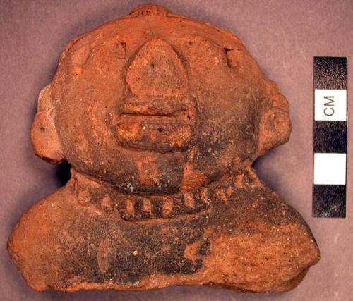 Ceramic human figurine head and shoulders, incised hair and necklace.