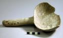 Dipper, brown on white ware. four perforations on handle