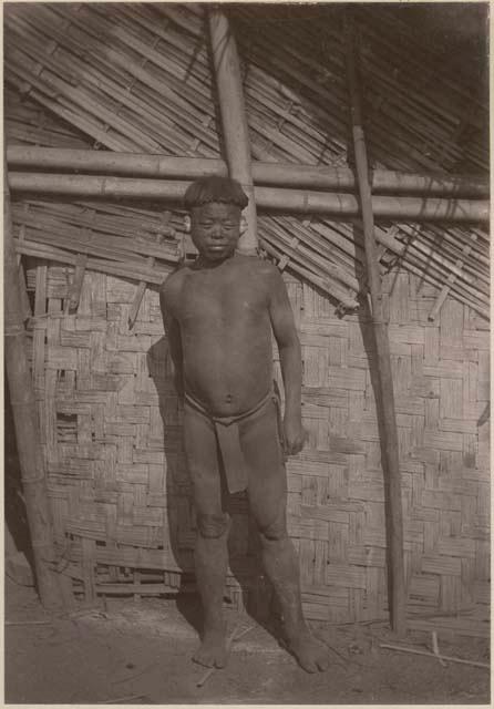 Man standing in front of structure