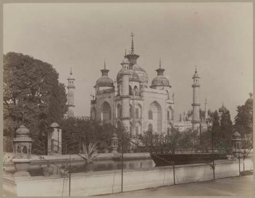 Building with arched windows, towers, and domes