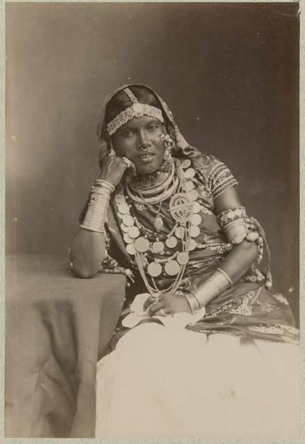 Studio portrait of woman wearing jewelry