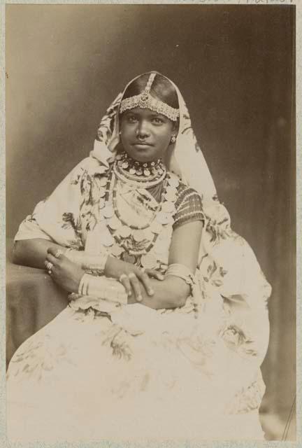 Studio portrait of woman wearing jewelry