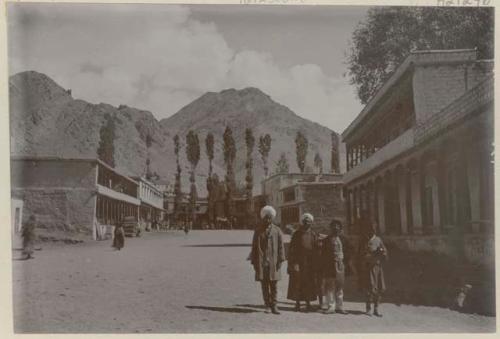 Leh Main Bazaar with people standing in front