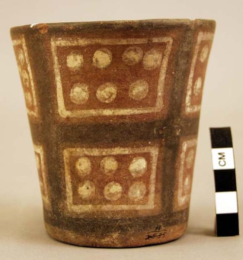 Ceramic cup with flared body, painted polychrome geometric design exterior