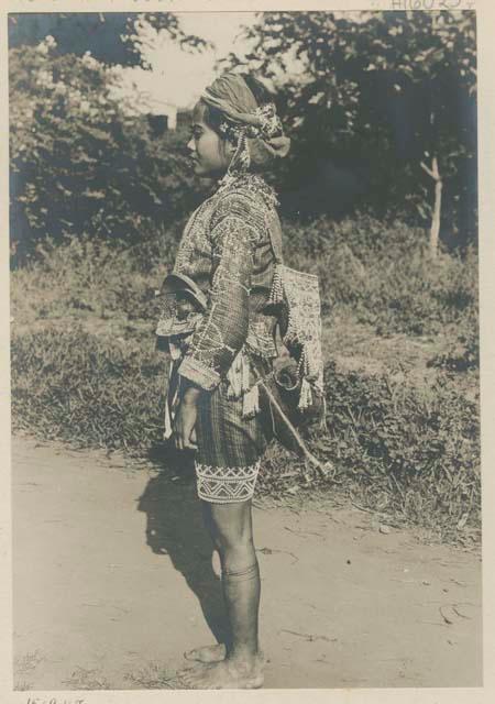 Bagobo person wearing traditional clothing, profile