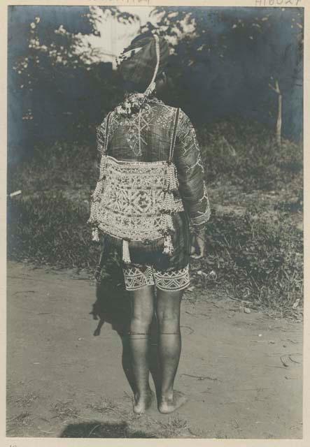 Bagobo person wearing traditional clothing, back