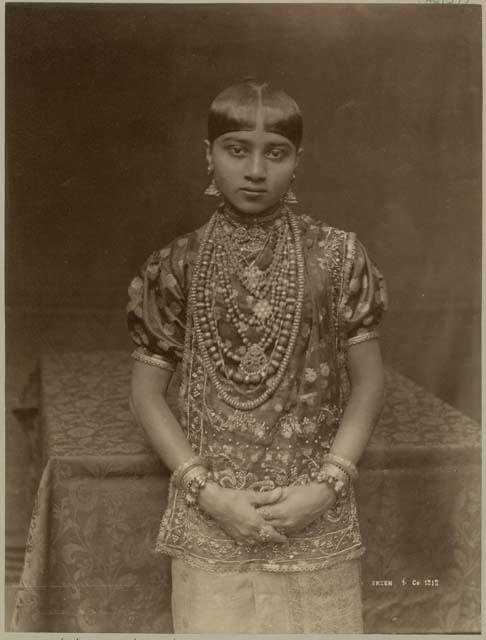 Studio portrait of upper class Kandyan woman