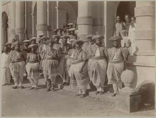 Group of Kandyan chiefs on stairs