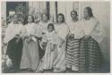 Group of women in front of window