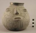 Black incised pottery jar - early piece