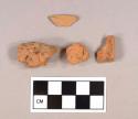 Three brick fragments; one redware body sherd