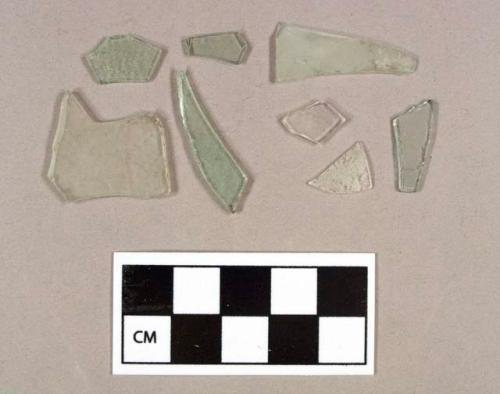 Glass, 34 fragments of aqua flat glass; three pieces of colorless bottle glass