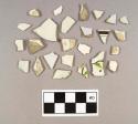 Fifteen body sherds of pearlware; two body sherds of molded pearlware; two body sherds of creamware; two body sherds of whiteware; two body sherds of brown and green hand painted whiteware; one rim sherd of brown hand painted whiteware; one body sherd of tin glazed earthenware