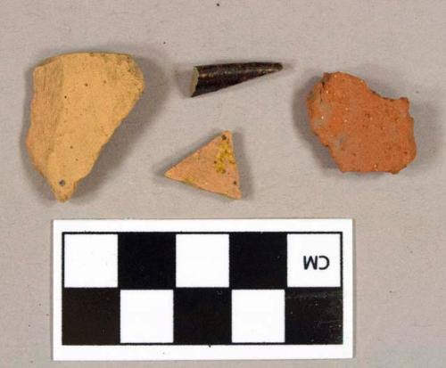 One brick fragment; one unglazed redware body sherd; one lead glazed redware body sherd; one lead glazed redware rim sherd