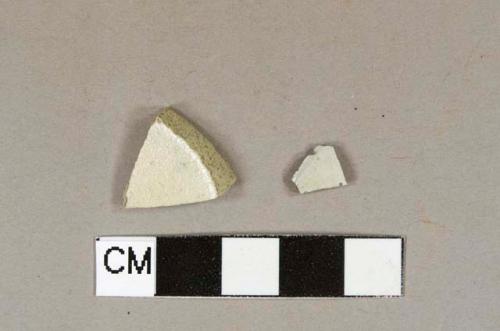 One gray stoneware body sherd; one white salt glazed stoneware base sherd