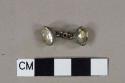 Button, sleeve, pewter, intact; cufflink, gem-shaped cut glass on both faces