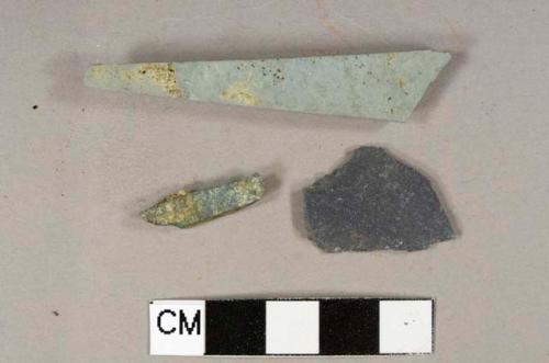 Roofing(?) slate fragments, 2 light gray, 1 dark gray