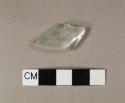 Colorless vessel glass fragment, likely neck fragment, mold seam present