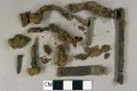 Ferous nail fragments, 1 flat metal likely bracket