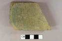 Cut stone cobble, likely architectual