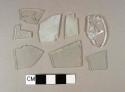 Glass, 20 fragments of aqua flat glass; one fragment of colorless flat glass