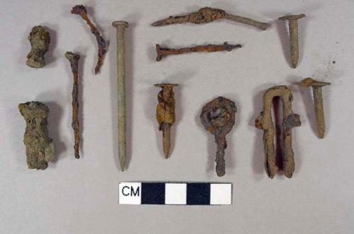 Iron nails and fragments, mostly wire nails; steel wire nails; iron loop; U-shaped iron object