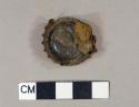 Iron crown bottle cap with plastic lining stamped with "6"