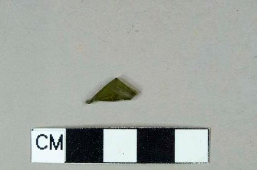 Olive green flat glass fragment