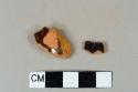 Dark brown lead glaze redware vessel body fragments, possible jackfield type