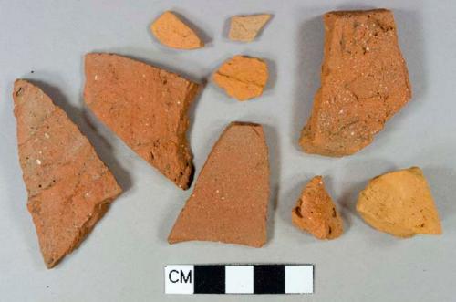 Red brick fragments, 3 crossmend; 3 fragments of redware vessel body fragments, unglazed, undecorated