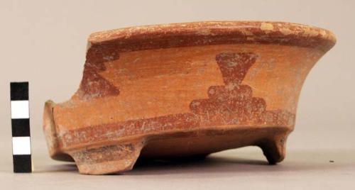 Fragment of small dish with two small legs