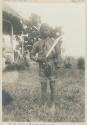 Bagobo man with fighting knife drawn