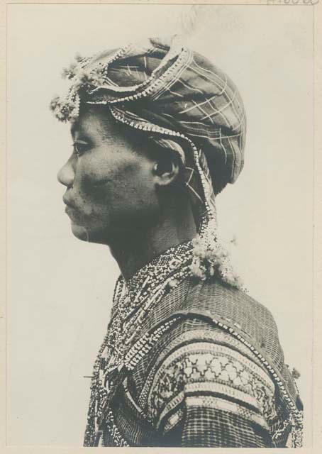 Bagobo man wearing traditional clothing, profile