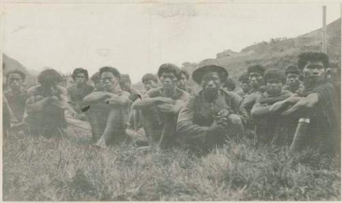 Group of men sitting