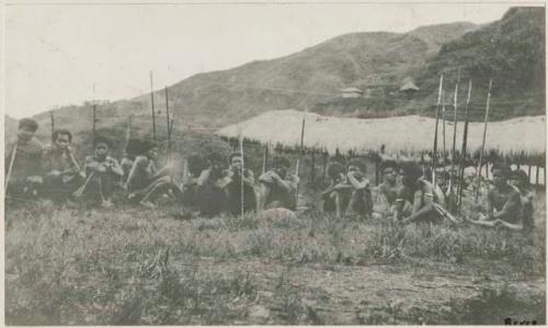 Group of men sitting