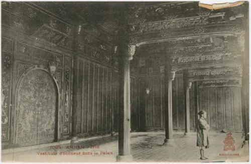 Person standing inside palace