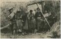 Family standing in front of a doorway