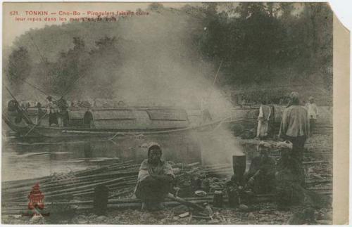 Men and boats along shore