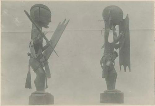 Side view of two anito images