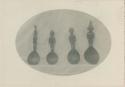 Four carved wooden spoons
