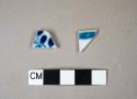 Blue handpainted porcelain body sherd; blue handpainted porcelain rim sherd