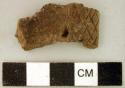 Ceramic, earthenware rim sherd, incised and punctate design