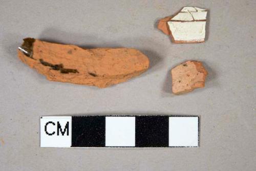 One unglazed redware body sherd; one lead glazed redware body sherd; one North Devon sgraffito body sherd