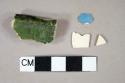 Two creamware body sherds; one blue glazed annular banded whiteware body sherd; one green lead glazed borderware rim sherd