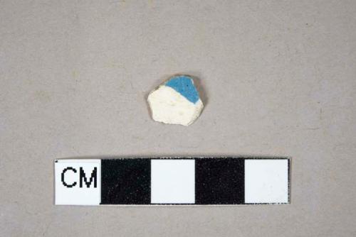 Factory decorated pearlware body sherd with blue decoration