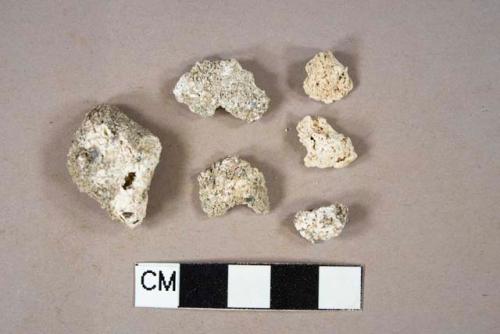 Mortar fragments with inclusions